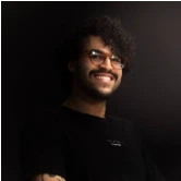 Portrait of a smiling man with glasses